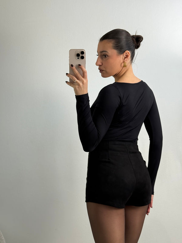 Top scollo asimmetrico