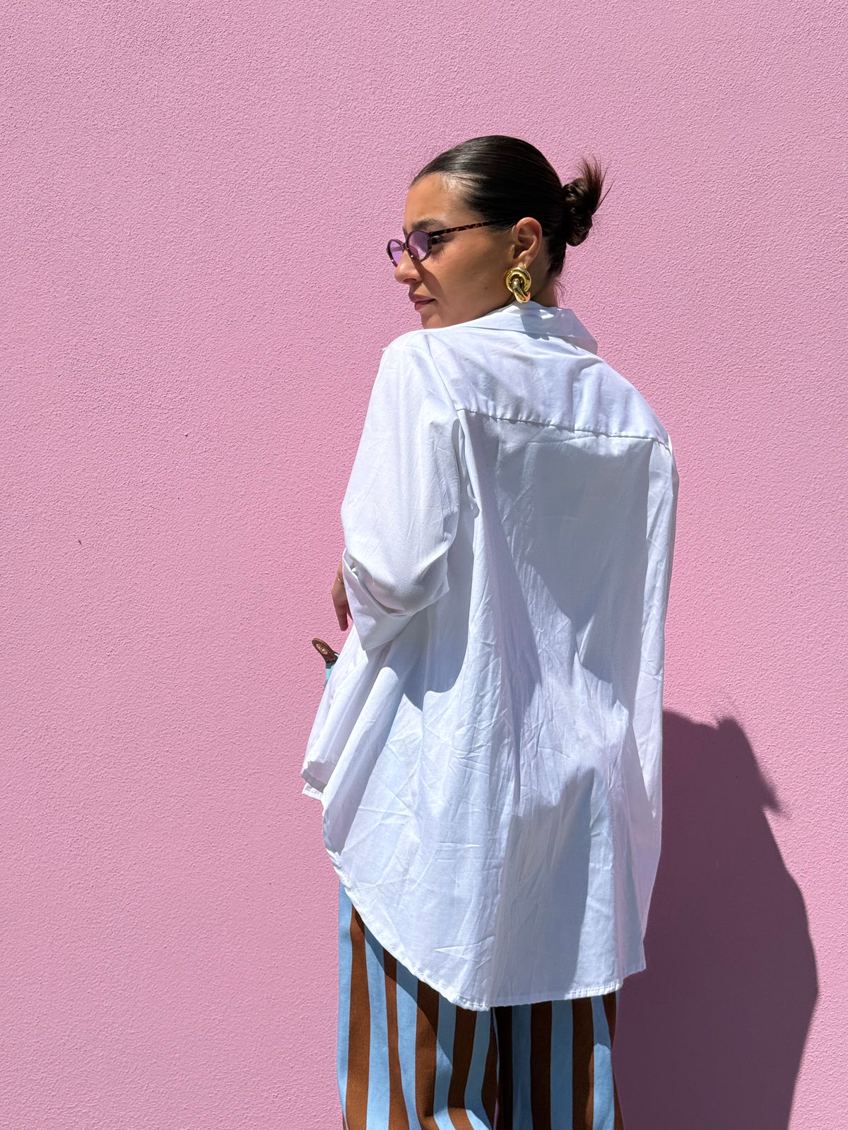 Camicia lunga dietro