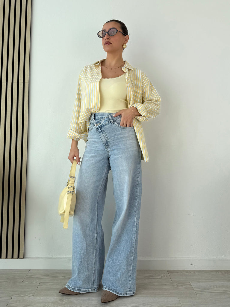 Jeans bottone sfalzato