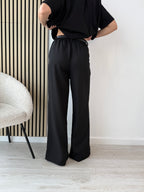 Pantaloni palazzo con cintura