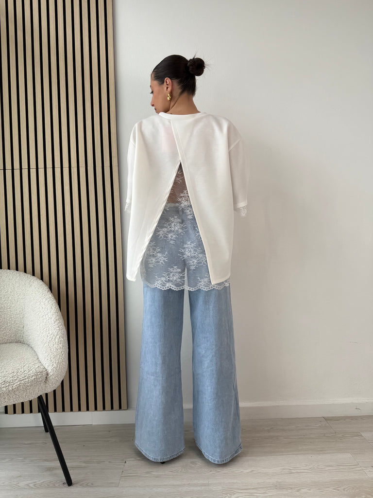 Maglia over pizzo apertura sul retro
