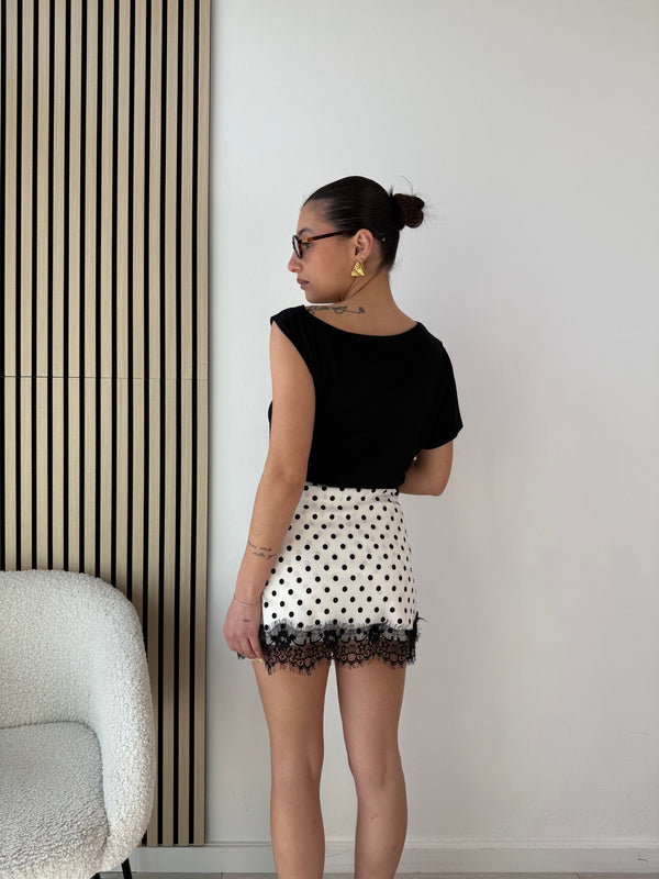 Top manica assimetrica