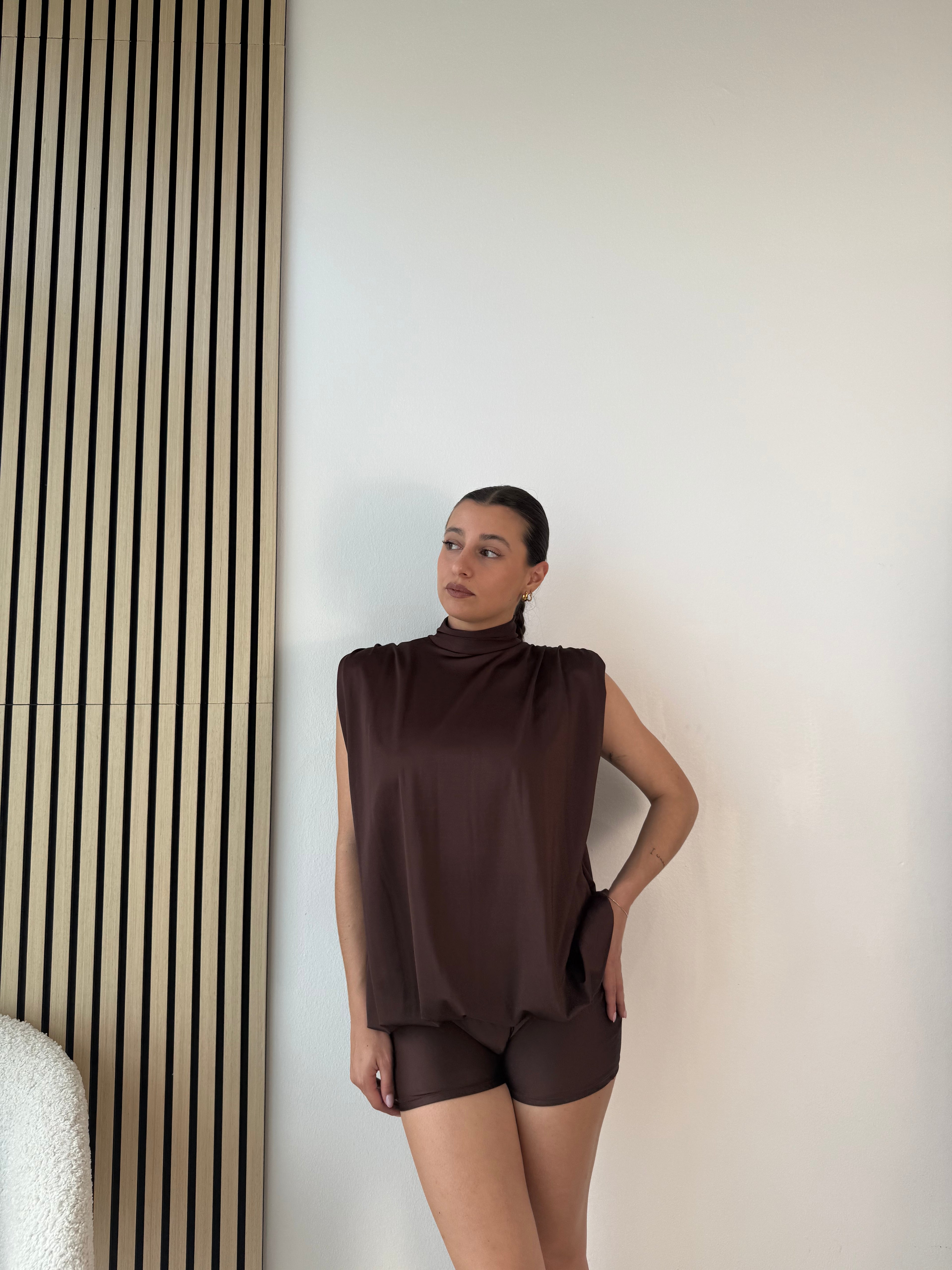 Tutina con schiena scoperta