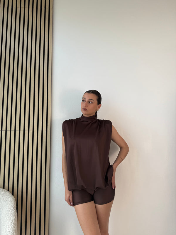 Tutina con schiena scoperta